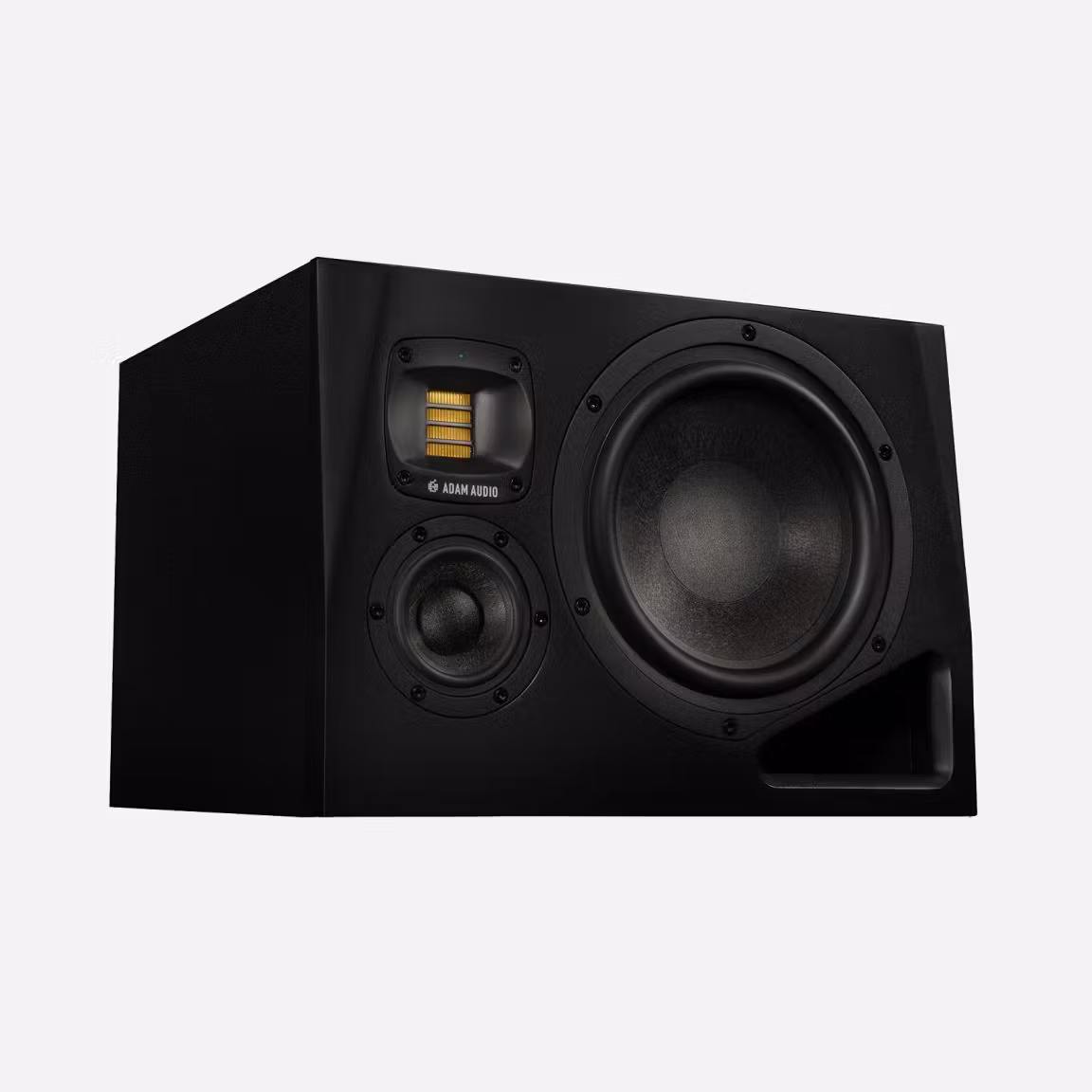 Angled product shot of a black Adam Audio three‑way studio monitor featuring a large woofer, midrange driver and signature yellow ribbon tweeter on a light gray background.