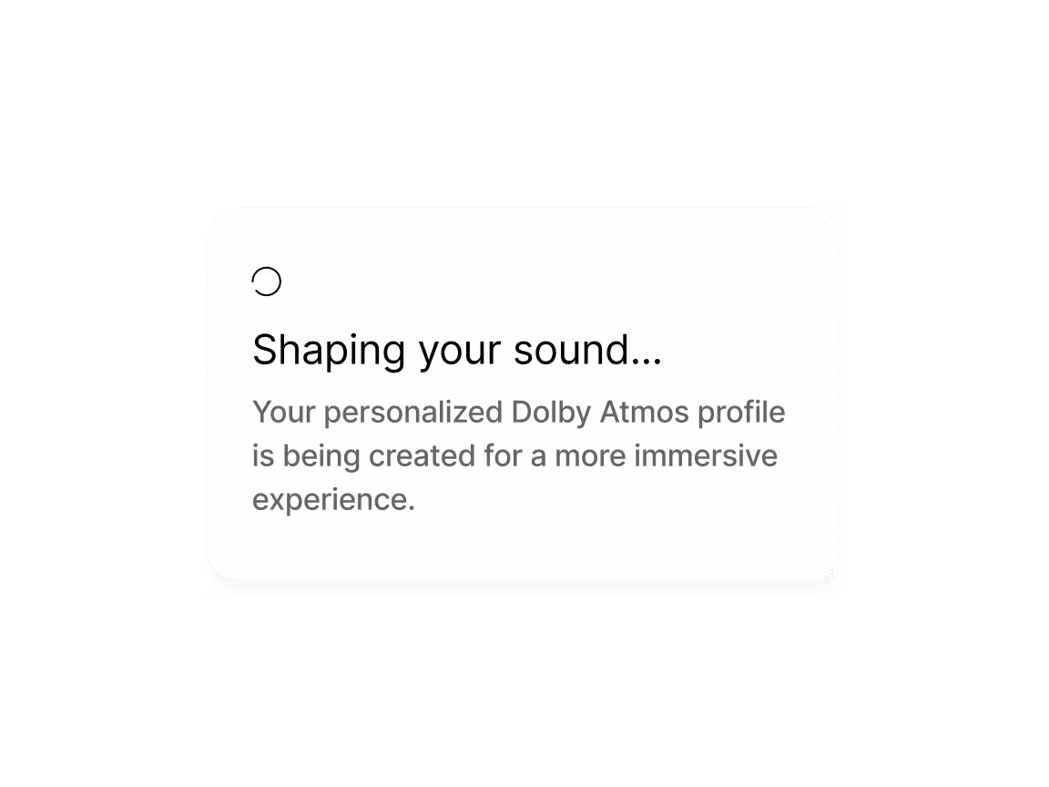 Loading screen card reading “Shaping your sound…” as a personalized Dolby Atmos profile is created for immersive audio.
