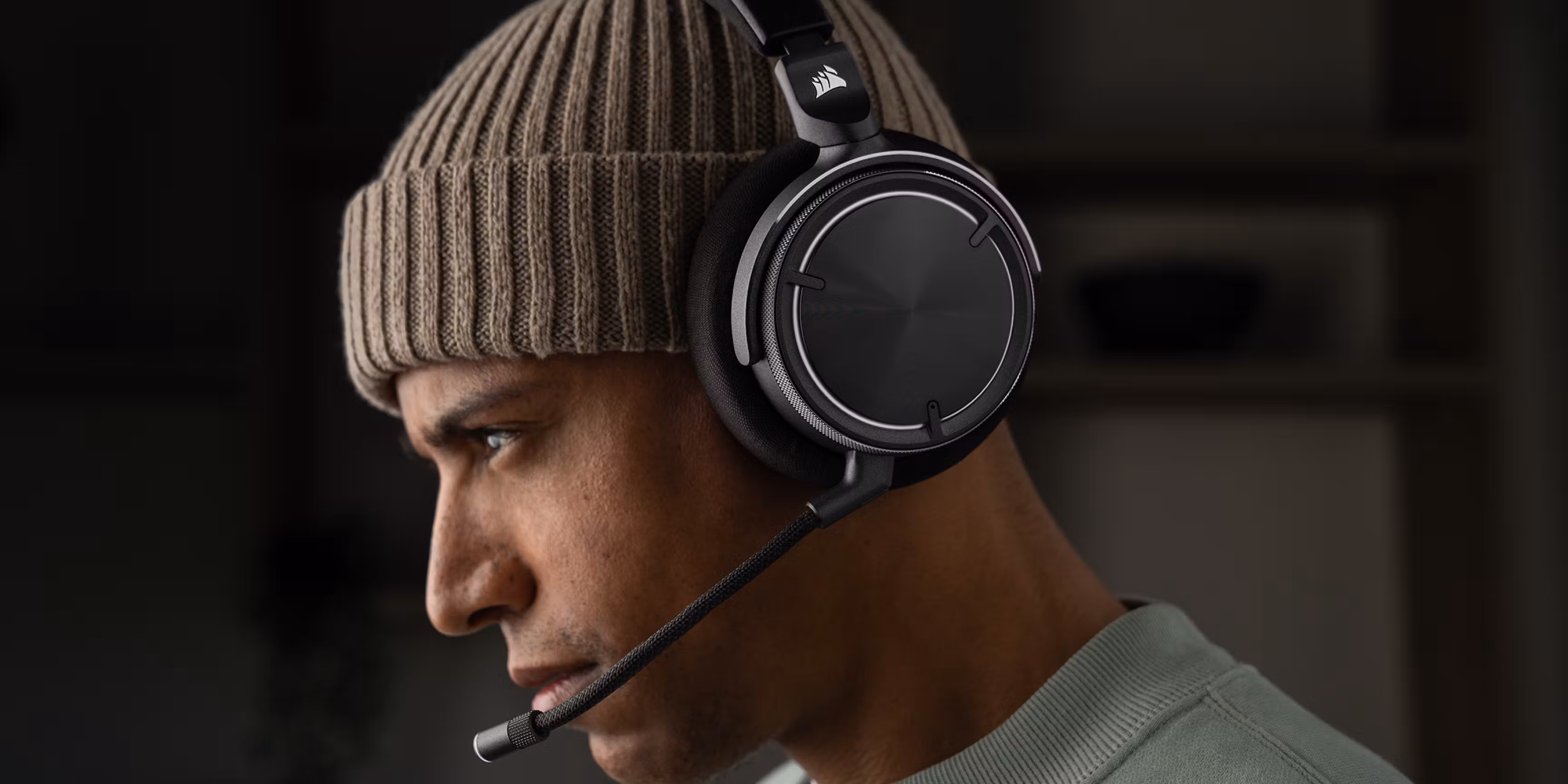 Man With Hat And Corsair Virtuoso Max Headphones